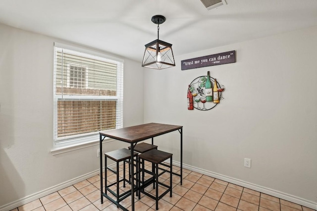 12508 Terra Nova Ln, Austin, TX 78727 - dining space with baseboards and light tile patterned flooring