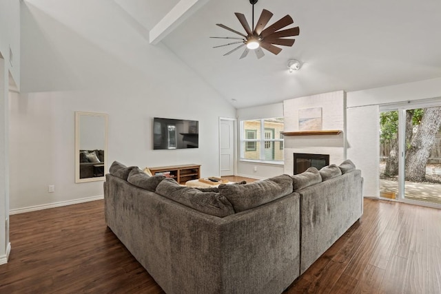 12508 Terra Nova Ln, Austin, TX 78727 - living room with beamed ceiling, a ceiling fan, a fireplace, healthy amount of natural light, and high vaulted ceiling