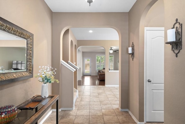 306 Water Oak Dr, Cedar Park, TX 78613 - corridor with arched walkways, light tile patterned floors, baseboards, and recessed lighting
