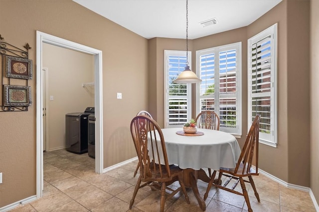 306 Water Oak Dr, Cedar Park, TX 78613 - dining area featuring independent washer and dryer, baseboards, and light tile patterned floors