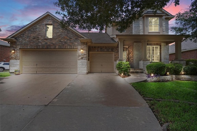 306 Water Oak Dr, Cedar Park, TX 78613 - view of front of property featuring concrete driveway, an attached garage, and covered porch