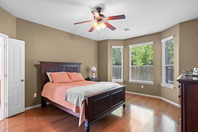 306 Water Oak Dr, Cedar Park, TX 78613 - bedroom featuring baseboards, wood finished floors, and ceiling fan