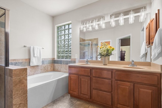 306 Water Oak Dr, Cedar Park, TX 78613 - bathroom with a stall shower, a bath, double vanity, and tile patterned floors