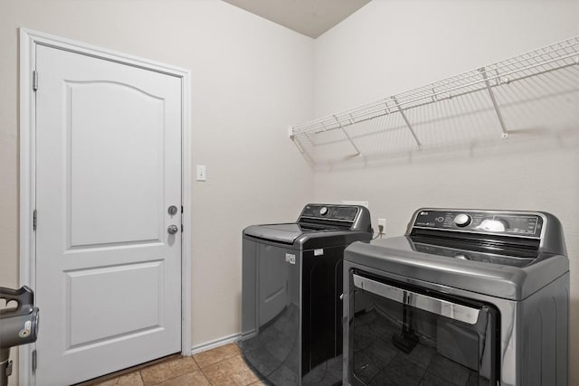 306 Water Oak Dr, Cedar Park, TX 78613 - washroom featuring washing machine and dryer and baseboards
