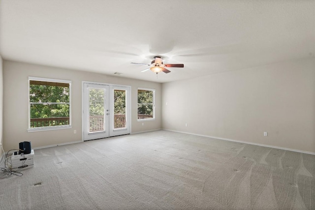 306 Water Oak Dr, Cedar Park, TX 78613 - unfurnished room featuring a ceiling fan, light colored carpet, french doors, and plenty of natural light