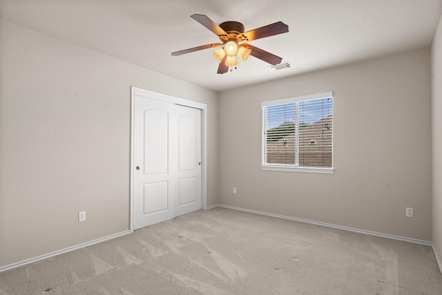 306 Water Oak Dr, Cedar Park, TX 78613 - unfurnished bedroom featuring carpet floors, baseboards, a closet, and ceiling fan