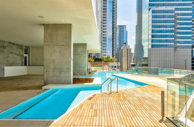 301 W Ave Unit 4103, Austin, TX 78701 - community pool featuring a view of city and a patio