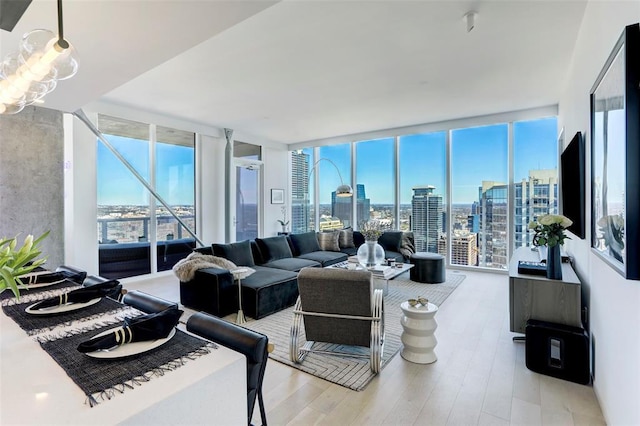 301 W Ave Unit 4103, Austin, TX 78701 - living area featuring floor to ceiling windows and light wood-type flooring