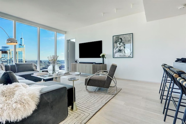 301 W Ave Unit 4103, Austin, TX 78701 - living room with a wall of windows and wood finished floors