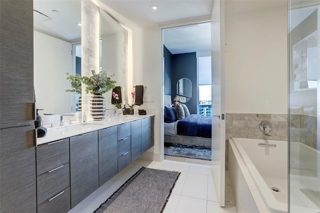 301 W Ave Unit 4103, Austin, TX 78701 - ensuite bathroom featuring double vanity, a bath, and tile patterned flooring