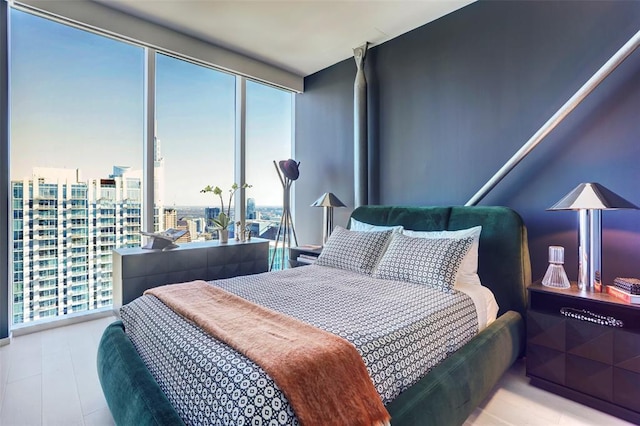 301 W Ave Unit 4103, Austin, TX 78701 - bedroom with expansive windows and a view of city