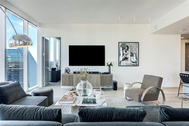 301 W Ave Unit 4103, Austin, TX 78701 - living room featuring light wood-style flooring