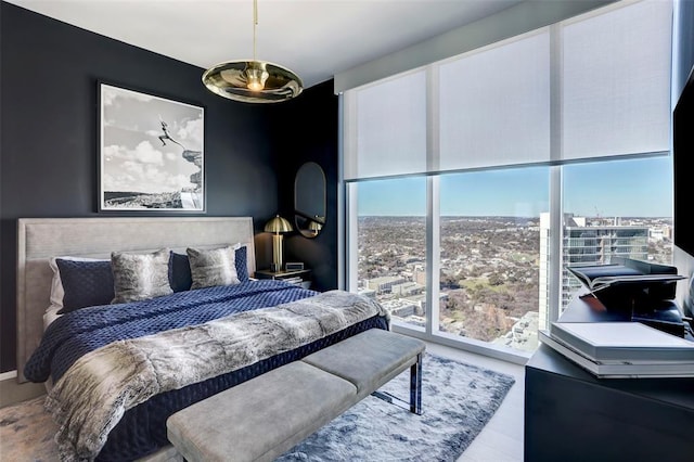 301 W Ave Unit 4103, Austin, TX 78701 - bedroom with wood finished floors