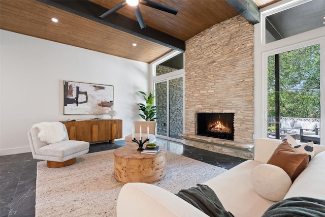 3403 Cascadera Dr, Austin, TX 78731 - living room with a wooden ceiling with exposed beams, a fireplace, a ceiling fan, and recessed lighting