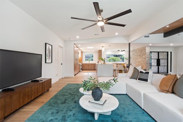 3403 Cascadera Dr, Austin, TX 78731 - living area featuring light wood-style floors, ceiling fan, and recessed lighting