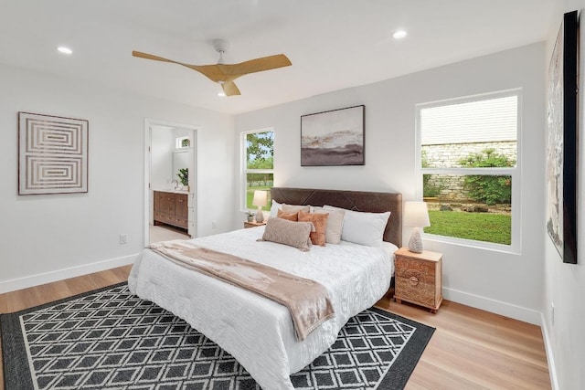 3812 Tarragona Ln, Austin, TX 78727 - bedroom with light wood finished floors, baseboards, recessed lighting, ceiling fan, and ensuite bathroom