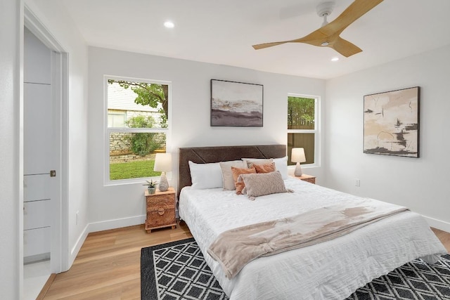 3812 Tarragona Ln, Austin, TX 78727 - bedroom with multiple windows, light wood-type flooring, recessed lighting, baseboards, and ceiling fan