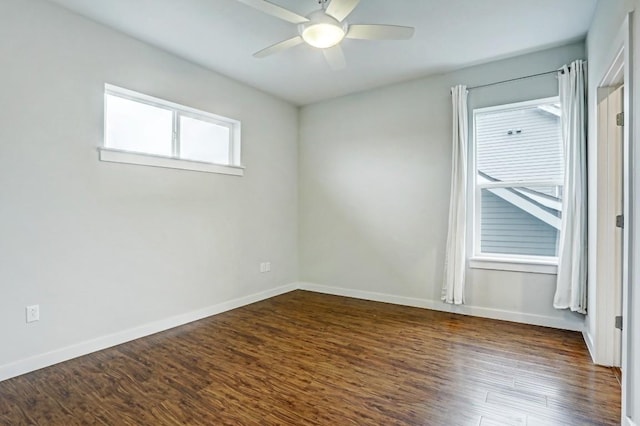 301 W Stassney Ln Unit 7, Austin, TX 78745 - spare room with dark wood finished floors, baseboards, and a ceiling fan