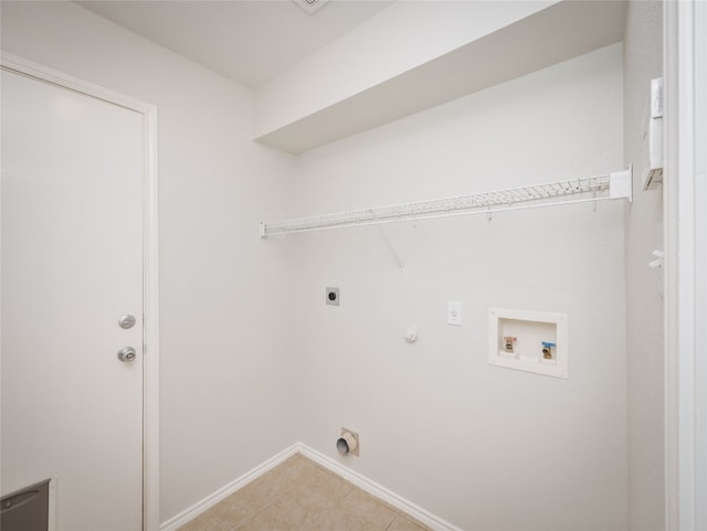 604 Creston St, Hutto, TX 78634 - laundry room with hookup for an electric dryer, washer hookup, baseboards, and hookup for a gas dryer