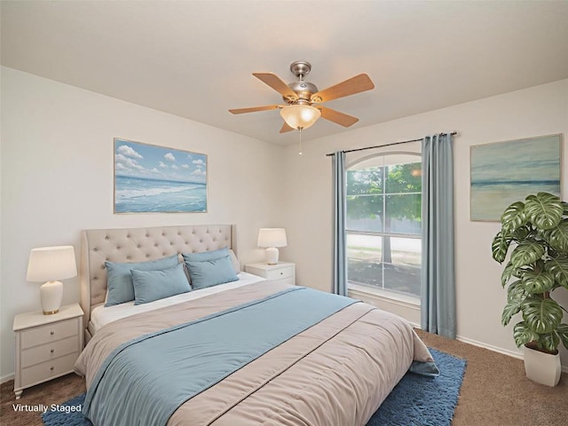 604 Creston St, Hutto, TX 78634 - carpeted bedroom with baseboards and ceiling fan