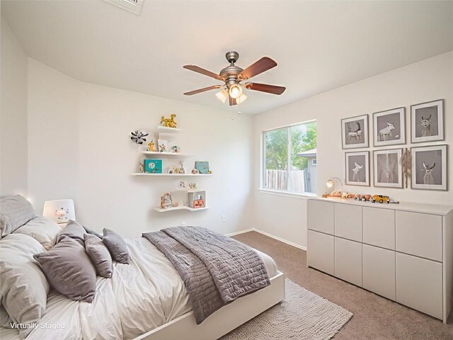 604 Creston St, Hutto, TX 78634 - bedroom featuring carpet flooring, baseboards, and ceiling fan