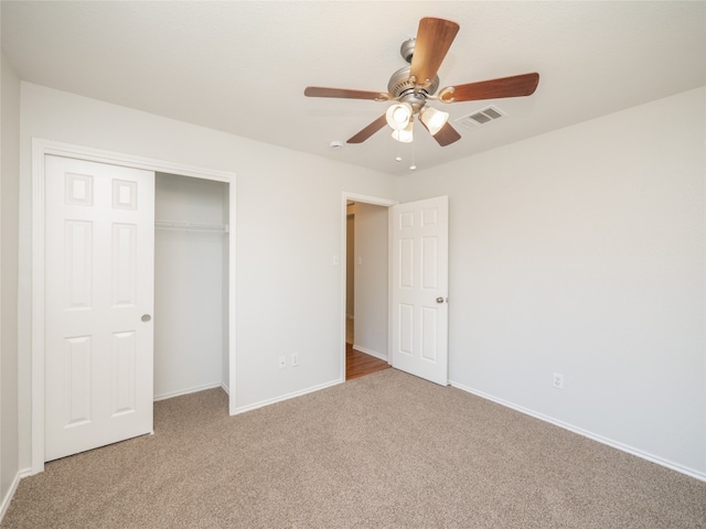 604 Creston St, Hutto, TX 78634 - unfurnished bedroom with carpet flooring, baseboards, a closet, and a ceiling fan