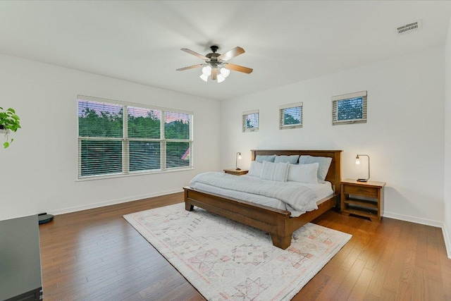 9308 Prince Charles, Austin, TX 78730 - bedroom featuring hardwood / wood-style flooring, baseboards, and ceiling fan