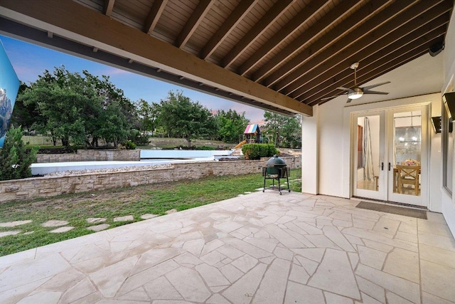 9308 Prince Charles, Austin, TX 78730 - view of patio with french doors, ceiling fan, a playground, and a grill