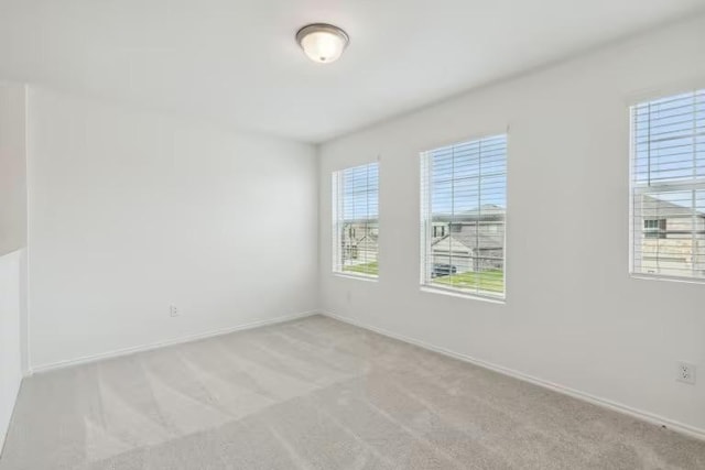 2807 Dimmit Dr, Temple, TX 76501 - empty room featuring light colored carpet and baseboards