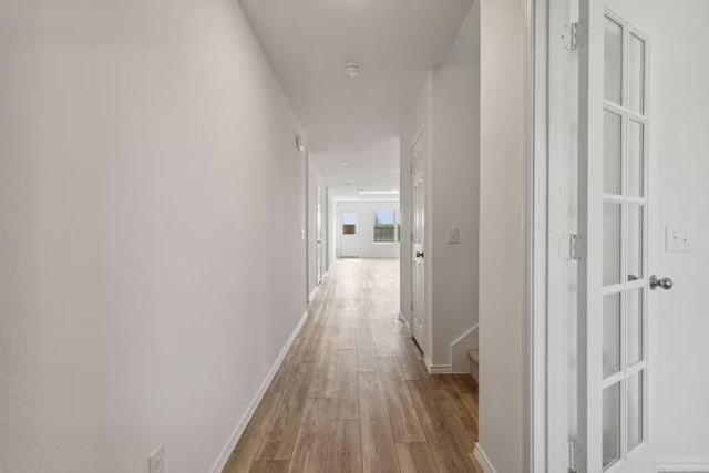 2807 Dimmit Dr, Temple, TX 76501 - hallway featuring wood finished floors and baseboards