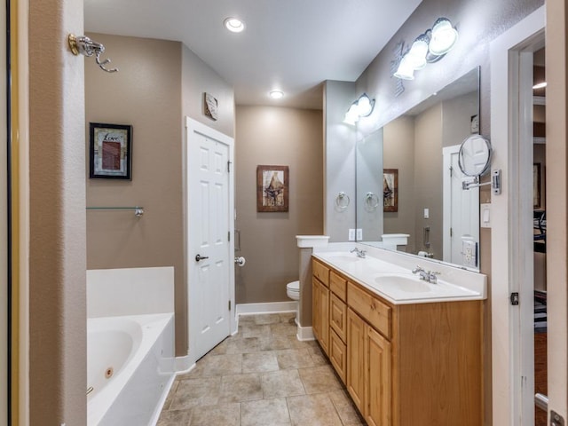 20104 Bunker Cv, Lago Vista, TX 78645 - full bath with a jetted tub, double vanity, and recessed lighting