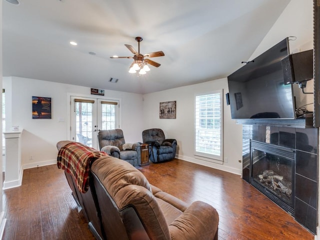 20104 Bunker Cv, Lago Vista, TX 78645 - living area with hardwood / wood-style floors, ceiling fan, a fireplace, healthy amount of natural light, and recessed lighting
