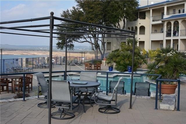 3404 American Dr Unit 2101, Lago Vista, TX 78645 - view of patio featuring a community pool
