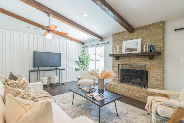 10108 Osprey Ct, Austin, TX 78750 - living room with a brick fireplace, wood finished floors, and ceiling fan