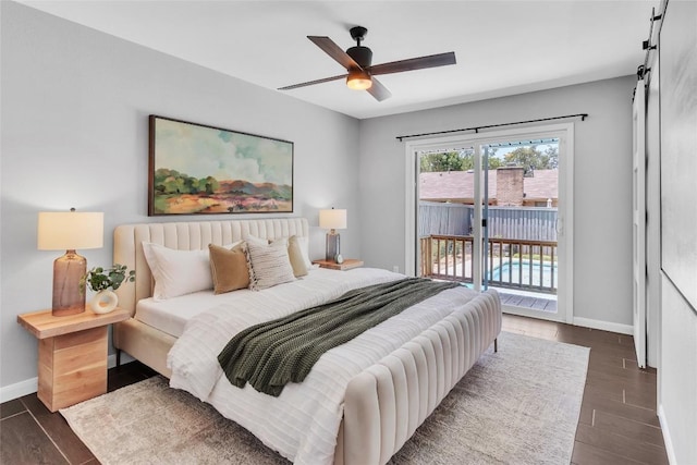 10108 Osprey Ct, Austin, TX 78750 - bedroom with access to outside, baseboards, dark wood-style floors, a barn door, and ceiling fan