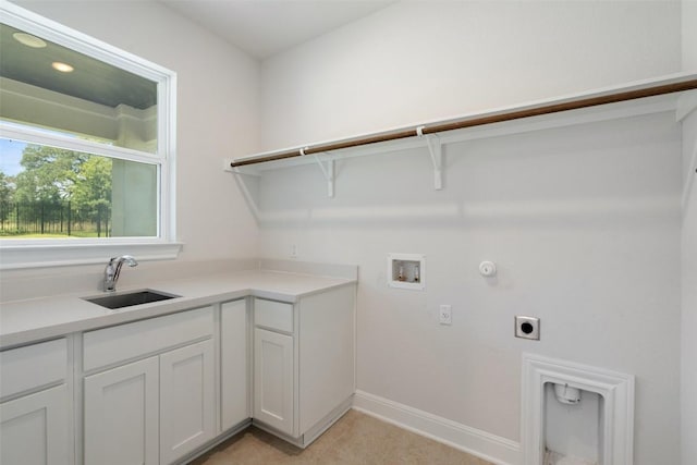 159 Fireside Rd, Austin, TX 78737 - washroom with hookup for an electric dryer, hookup for a washing machine, and light tile patterned floors