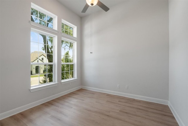 159 Fireside Rd, Austin, TX 78737 - unfurnished room featuring healthy amount of natural light, ceiling fan, and light wood-style flooring