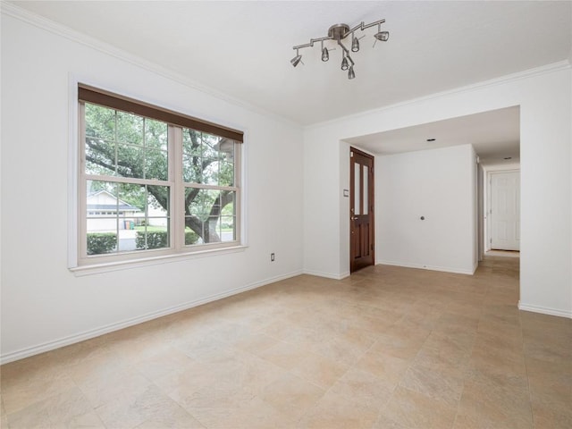 12208 Antoinette Pl, Austin, TX 78727 - spare room featuring ornamental molding and baseboards