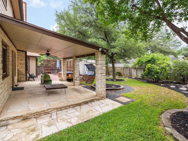 12208 Antoinette Pl, Austin, TX 78727 - view of yard featuring a ceiling fan and a patio area