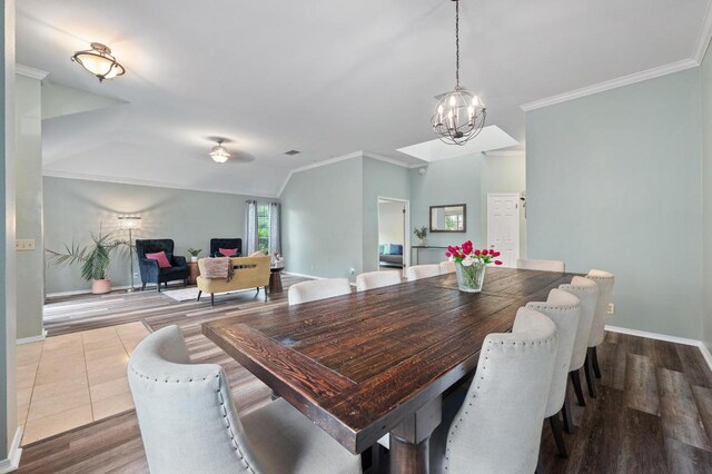 8007 Weldon Springs Ct, Austin, TX 78726 - dining space featuring a chandelier, crown molding, and dark wood finished floors