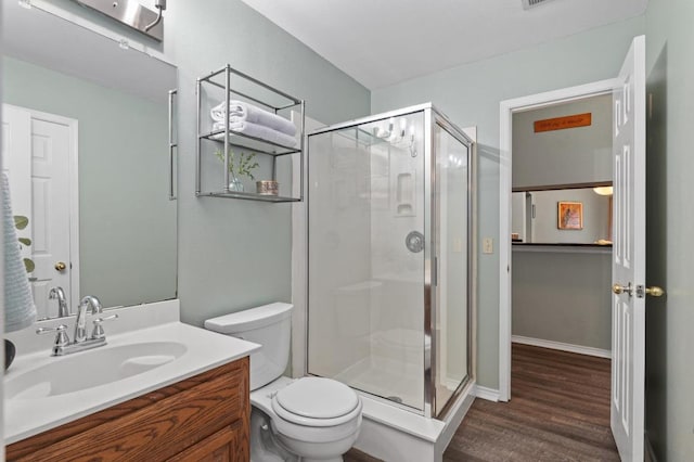 8007 Weldon Springs Ct, Austin, TX 78726 - full bath with vanity, wood finished floors, and a shower stall
