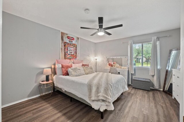 8007 Weldon Springs Ct, Austin, TX 78726 - bedroom featuring dark wood-style flooring and ceiling fan