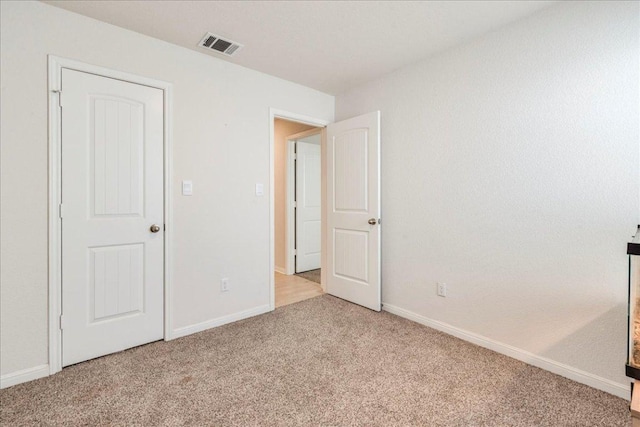 185 Standing Rock Ln, Marble Falls, TX 78654 - unfurnished bedroom featuring light colored carpet and baseboards