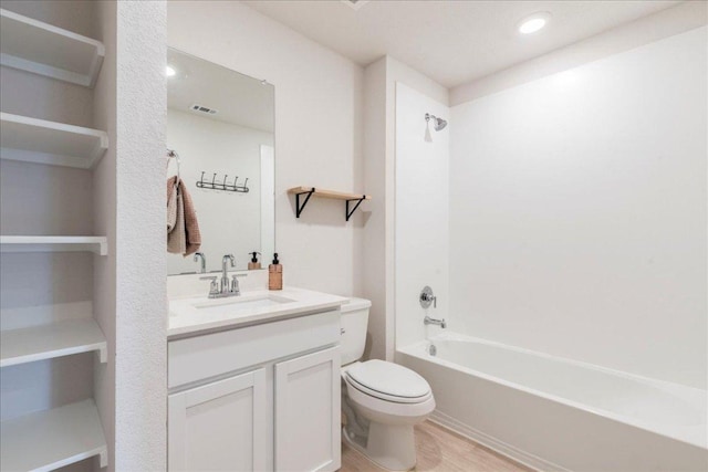 185 Standing Rock Ln, Marble Falls, TX 78654 - bathroom with toilet, vanity, shower / bath combination, and wood finished floors
