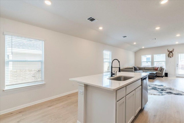 185 Standing Rock Ln, Marble Falls, TX 78654 - kitchen featuring a sink, light wood finished floors, plenty of natural light, recessed lighting, and baseboards