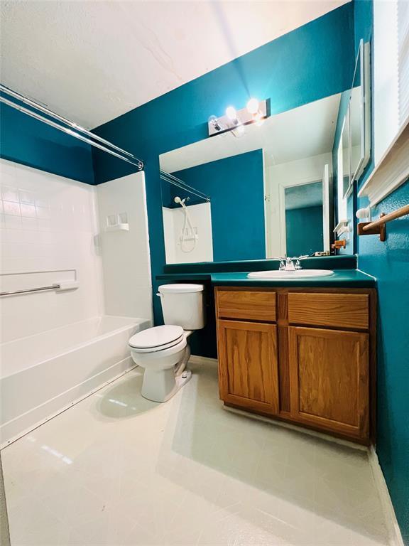 2105 W Gillis Ave, Cameron, TX 76520 - full bathroom featuring  shower combination and vanity