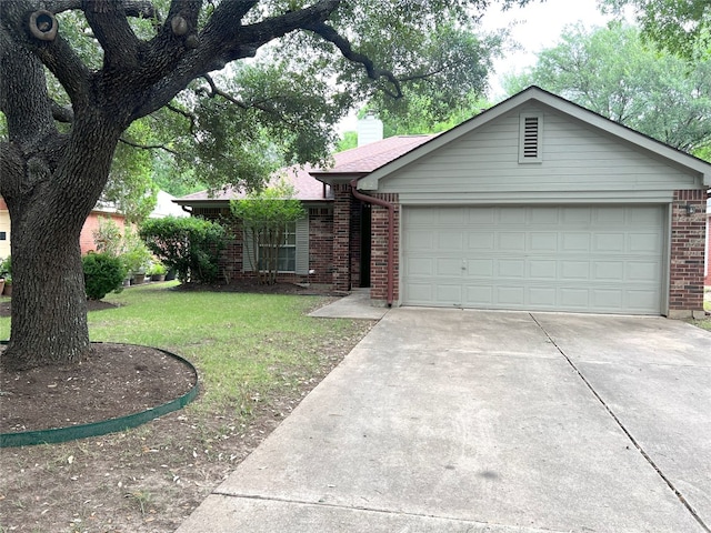 6612 Zequiel Dr, Austin, TX 78744 - single story home with brick siding, driveway, a chimney, and a garage