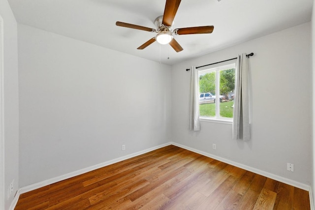 5000 Acorn Grove Ct, Austin, TX 78744 - unfurnished room featuring wood finished floors, ceiling fan, and baseboards