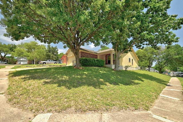 5000 Acorn Grove Ct, Austin, TX 78744 - view of front of property featuring a front lawn and a garage