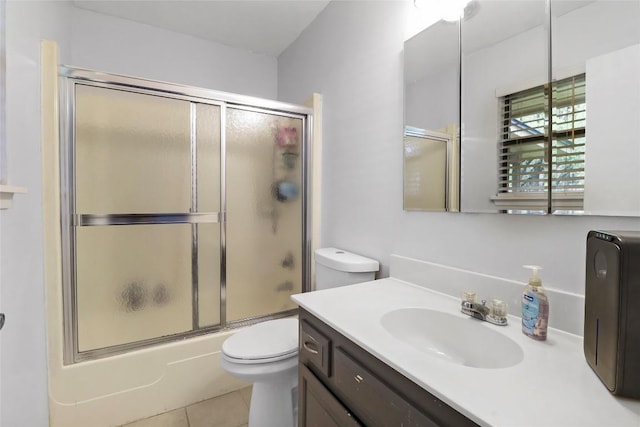 1313 Oakridge Dr, Blanco, TX 78606 - full bathroom with vanity, tile patterned flooring, and shower / bath combination with glass door
